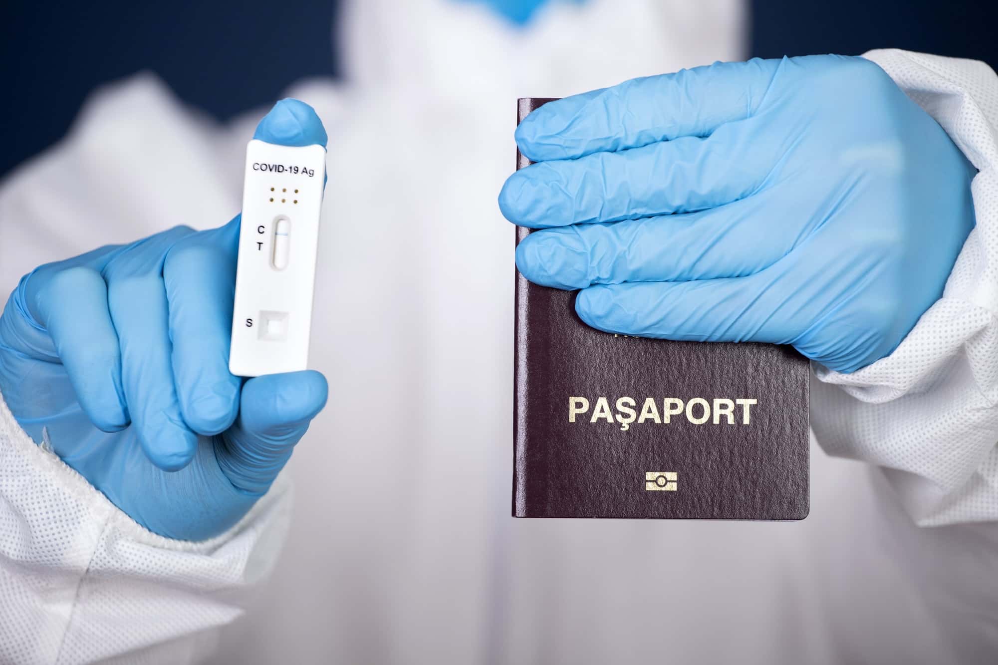 Doctor with laboratory COVID-19 negative test and passport.